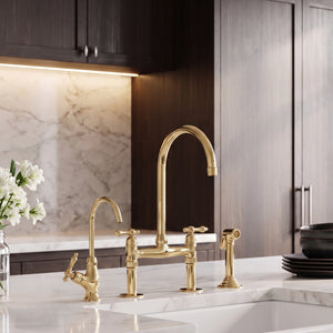 Solid unlacquered brass bridge kitchen faucet with Finial lever handles, sprayer and cold water tap