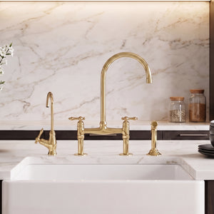 Side view of the unlacquered brass bridge kitchen faucet with Finial lever handles