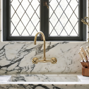 Unlacquered brass wall faucet, 11.5" high, 8" spread with cross handles