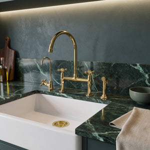 Solid unlacquered brass bridge kitchen faucet with Petal cross handles, sprayer and cold water tap