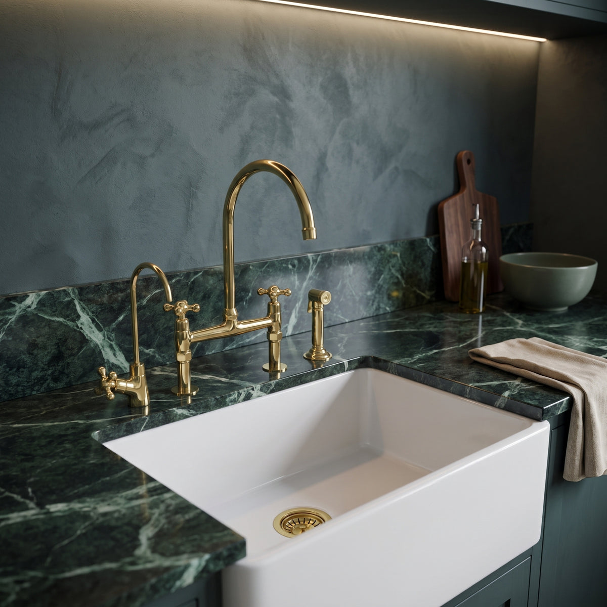 Side view of the unlacquered brass bridge kitchen faucet with Petal cross handles
