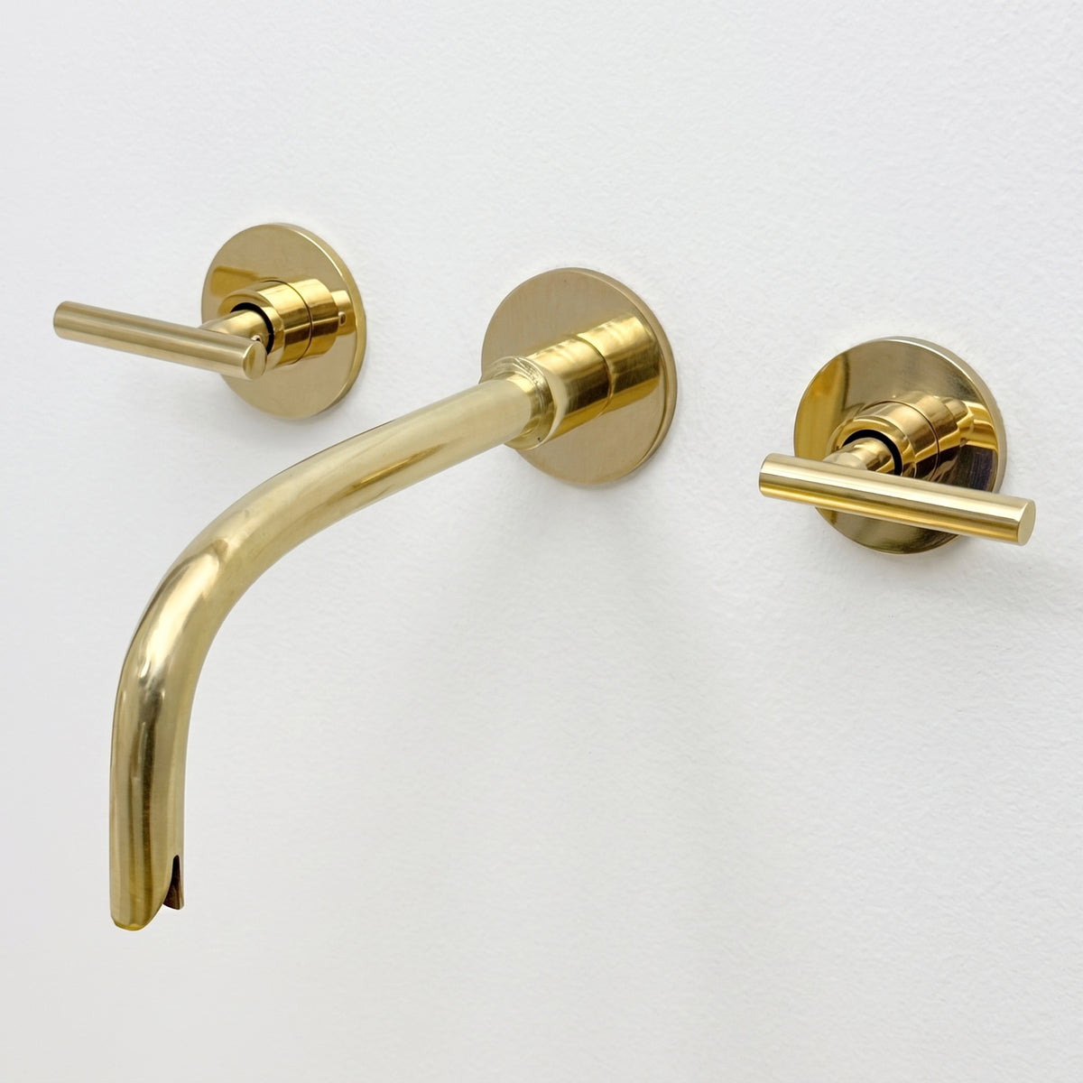Unlacquered Brass Wall-Mount Sink Faucet with Lever handles