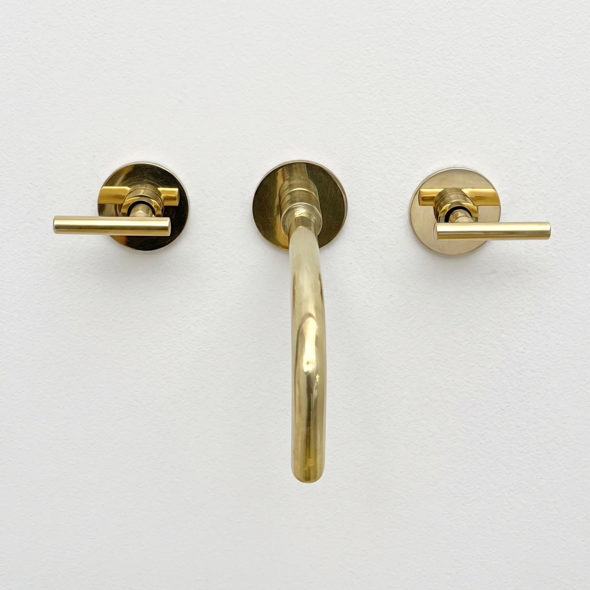 Unlacquered Brass Wall-Mount Sink Faucet with Lever handles