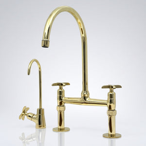 Unlacquered brass bridge kitchen faucet with cross handles and its solid brass living finish